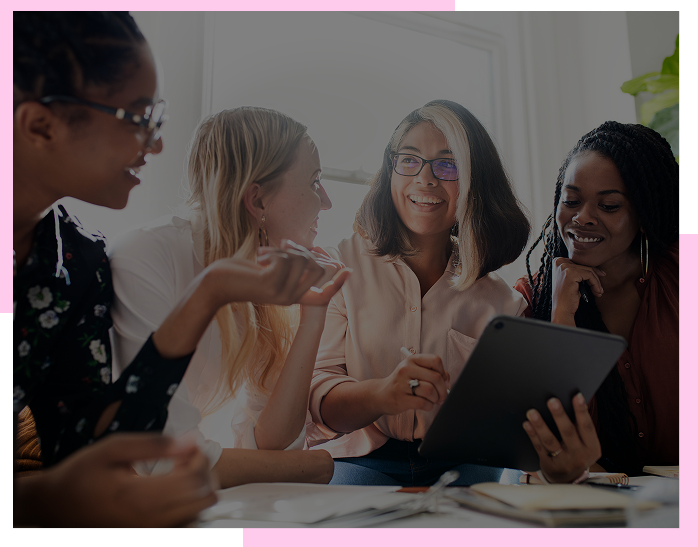 Influential women collaborating in a leadership meeting